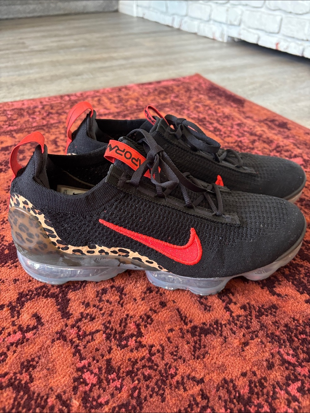 Nike Black Flyknit VaporMax with Red Swoosh and Leopard Heel